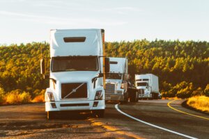 Truck driver managing IFTA quarterly fuel tax report with SafeRoad Compliance
