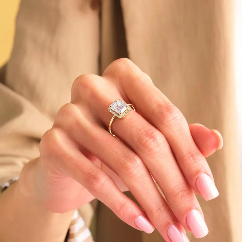 gold emerald engagement ring