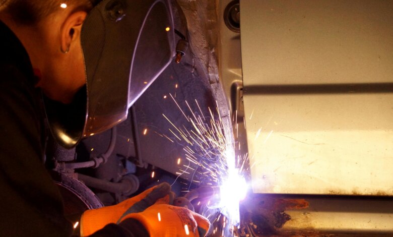 Mobile welding technician performing structural repair on-site in Idaho