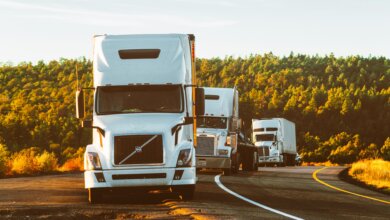 Truck driver managing IFTA quarterly fuel tax report with SafeRoad Compliance