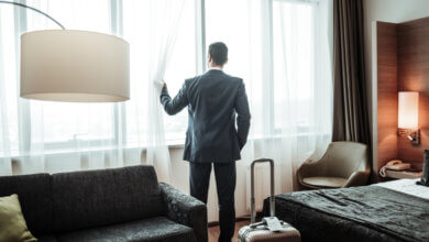 man in hotel room