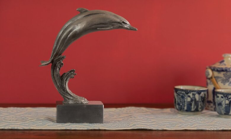 bronze dolphin statue