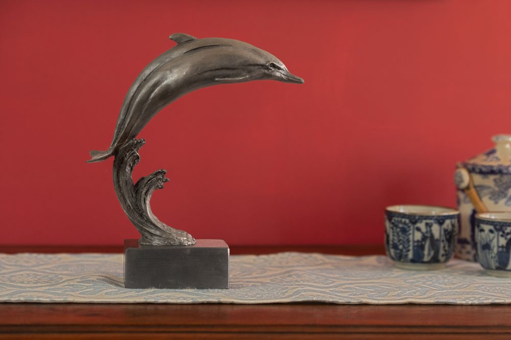 bronze dolphin statue