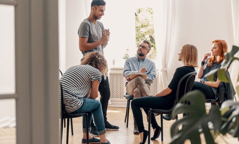 group-therapy-session-man-standing